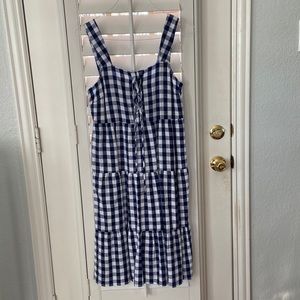 Navy blue and white checkered sun dress. Never worn brand new with tags